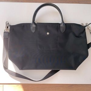 Longchamp Le Pliage Neo medium black nylon top handle tote bag.